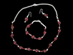 Silver and garnet jewellery set: necklace, bracelet, ear rings